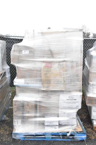 Pallet of 29 scratch and dent items wrapped in plastic, including plastic plates, containers, and hot cups, on blue pallet.