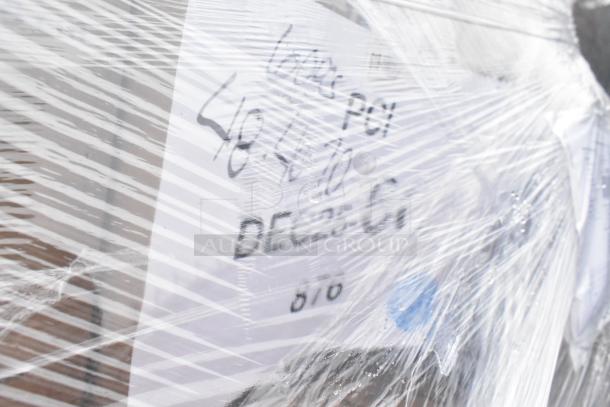 Plastic-wrapped pallet of 36 scratch and dent items including exam gloves, straws, and napkins. Labels partially visible.