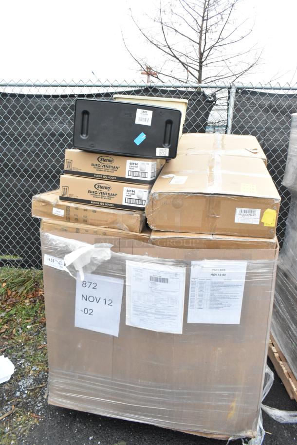 Pallet of 20 brand new scratch and dent items including Sterno storage box, syrup rack, and gloves, wrapped and labeled for auction.