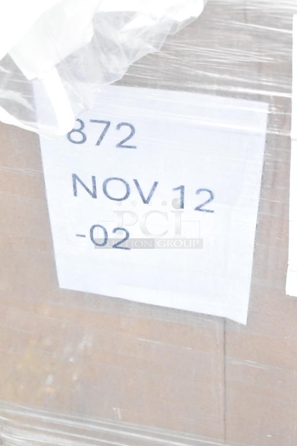 20 brand new scratch and dent items, including storage box, gloves, syrup rack. Visible label: "872 NOV 12 -02."