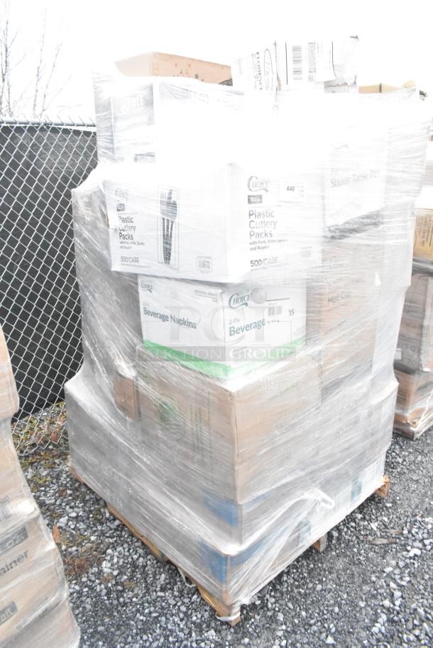 Pallet of 33 brand new scratch and dent items, including paper towels, plastic plates, and more, wrapped in plastic.
