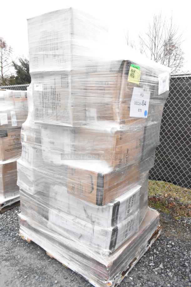 Pallet with 32 scratch and dent items including hot cups, pizza savers, grocery bags, wrapped in plastic for auction.