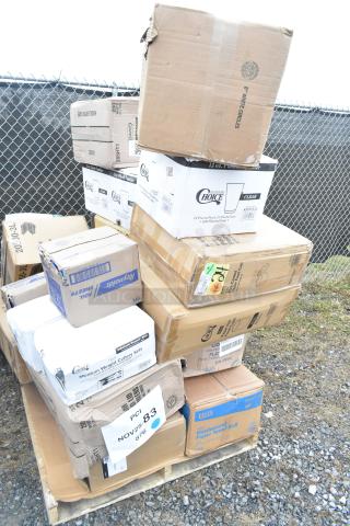 Pallet of new, scratch and dent items including food cups, cake circles, and cold cups in boxes. Labels indicate various brands.