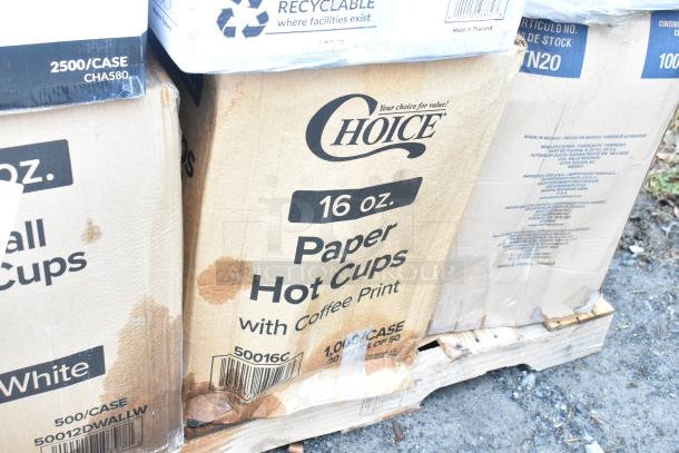 Cardboard boxes of 16 oz. Choice paper hot cups on pallet. Some boxes show watermarks and dents.