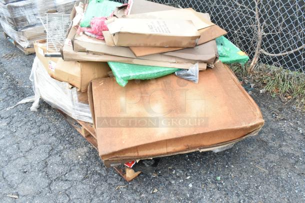 Eight brand new scratch and dent items on a pallet, including Winco SPJH-906GN steam table pan and Metro D56JN aluminum truck dolly.