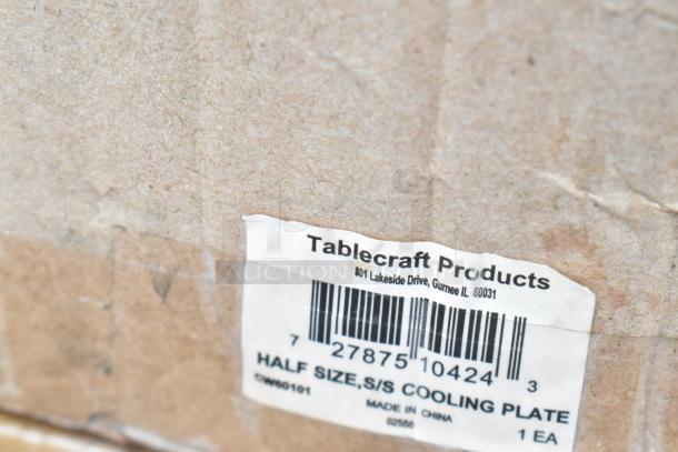 Box with a label from Tablecraft Products, featuring a barcode and details for a half-size stainless steel cooling plate.