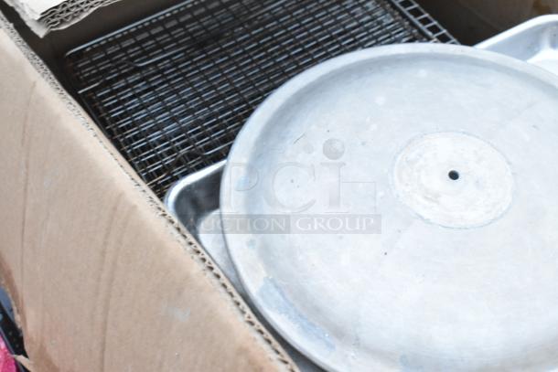 17 brand new items in a box, includes Tablecraft cooling plates, stainless steel drop-in bins, wooden trays, minor scratches.