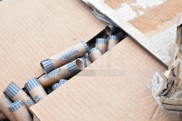 Box containing empty nickel coin wrappers labeled "$2.00 Nickels" seen through open cardboard.