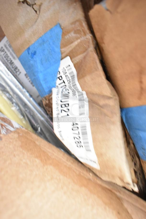 New scratch and dent auction items including Tablecraft cooling plates, stainless steel drop-in bins, and wooden trays.