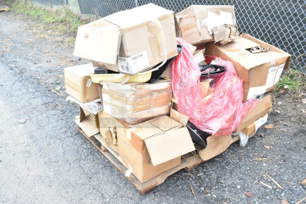 Seventeen new scratch and dent items on a pallet, including Tablecraft cooling plates, stainless steel bins, wooden trays.