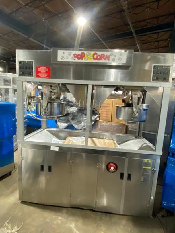 Gold Medal stainless steel popcorn popper, model 2973-137, with twin 52 oz. kettles and neon sign. Electric-powered, excellent condition.