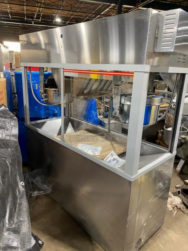 Gold Medal Model 2973-137 stainless steel popcorn popper, twin 52 oz. kettles, neon sign, cabinet style, electric, excellent condition.