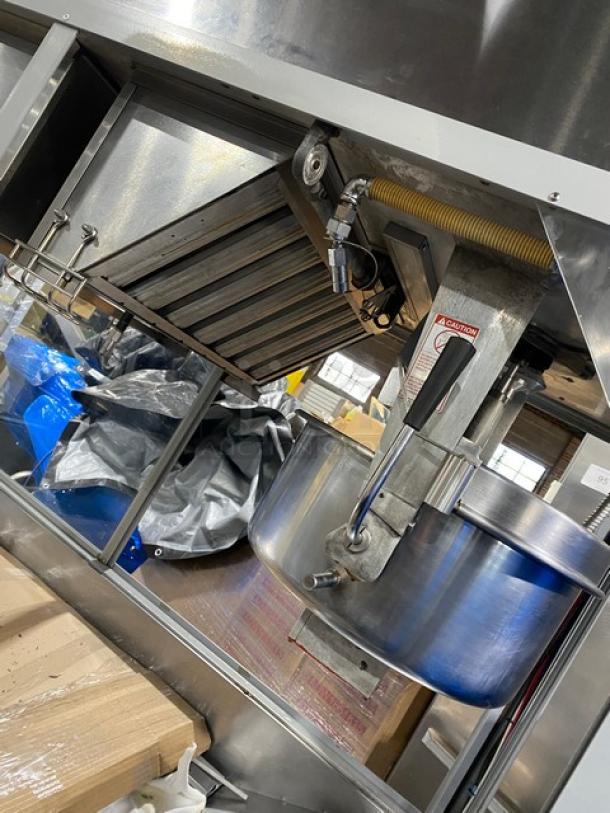 Gold Medal Model 2973-137 stainless steel popcorn popper, twin 52 oz. kettles, cabinet style, with neon sign, excellent condition.