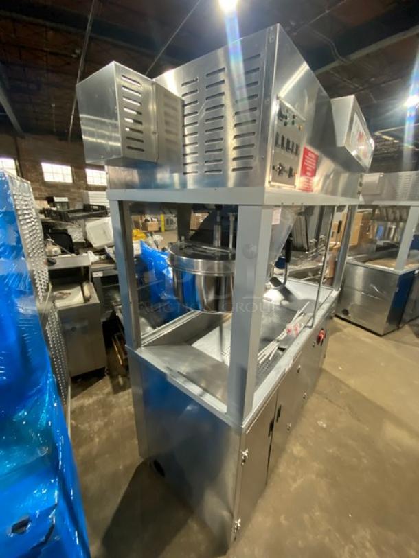 Gold Medal 2973-137 stainless steel popcorn popper with twin 52 oz kettles, neon popcorn sign, cabinet-style, excellent condition.