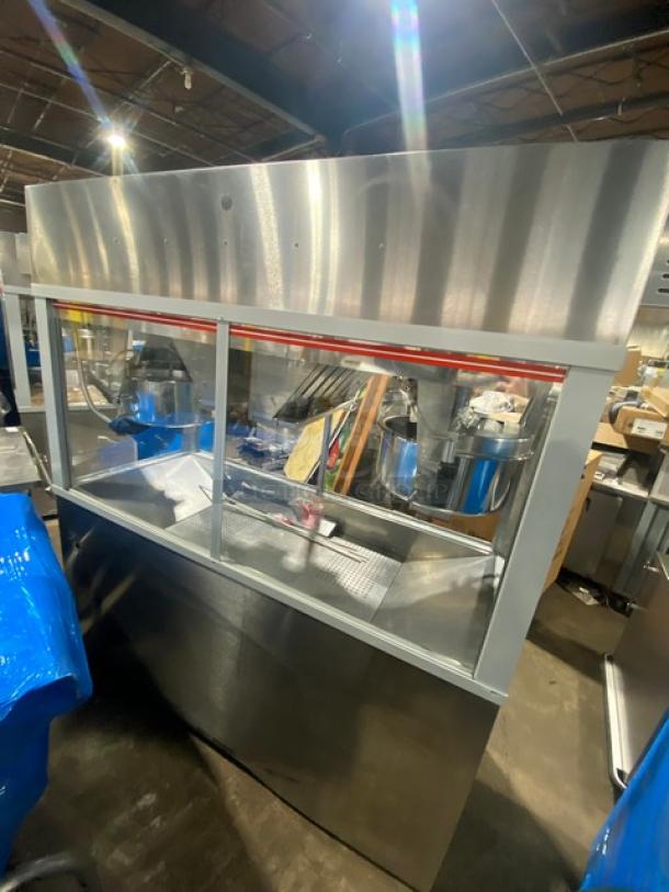 Gold Medal Model 2973-137 stainless steel popcorn popper with twin 52 oz kettles, neon sign. Excellent condition, electric powered.