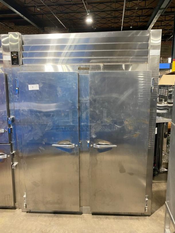 Traulsen commercial stainless steel 2-door refrigerator, model RHT232WUT172, with chrome racks, in used condition.