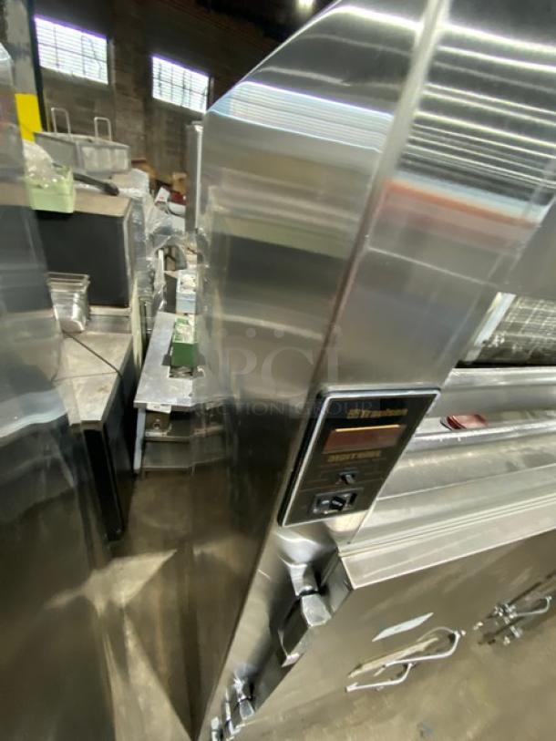 Traulsen RHT232WREHHS commercial stainless steel half-door refrigerator with chrome rack, 115V, light wear.