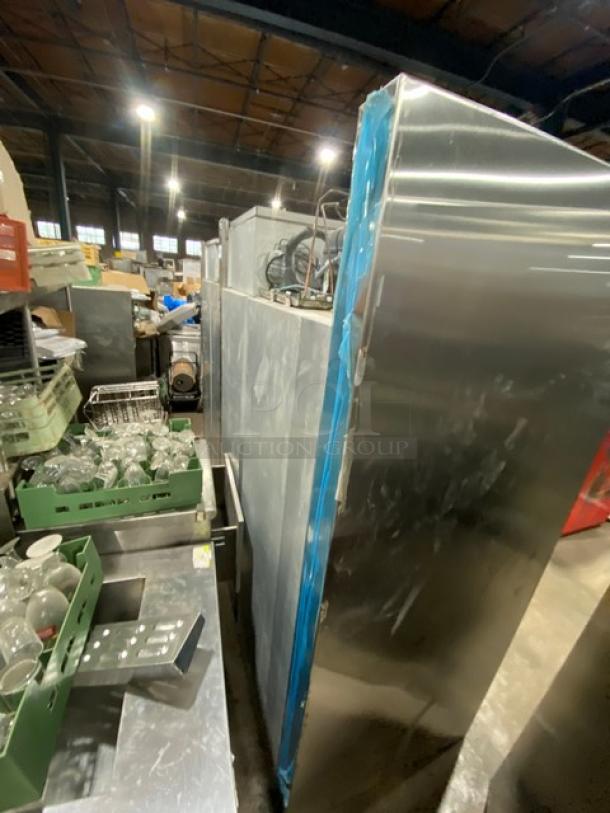 Traulsen stainless steel half-door double section reach-in refrigerator, model RHT232WREHHS, with chrome plated wire rack.