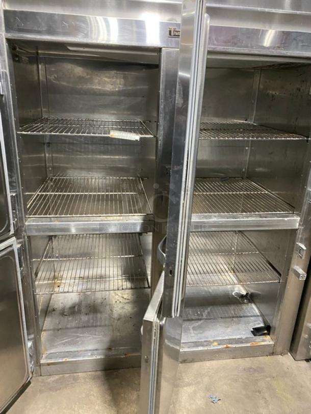 Traulsen stainless steel half-door double-section reach-in refrigerator, model RHT232WREHHS, with chrome plated wire racks.