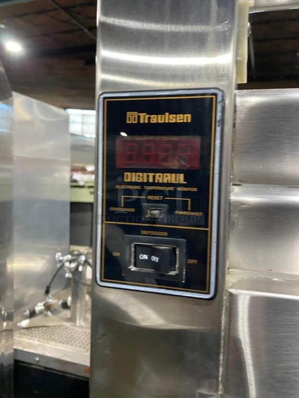 Traulsen RHT232WREHHS commercial refrigerator control panel, stainless steel, with digital temperature display, model label.