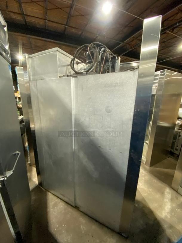 Traulsen stainless steel 2-door reach-in refrigerator, model 1RHT232WUT, features chrome-plated wired rack, commercial-grade condition.