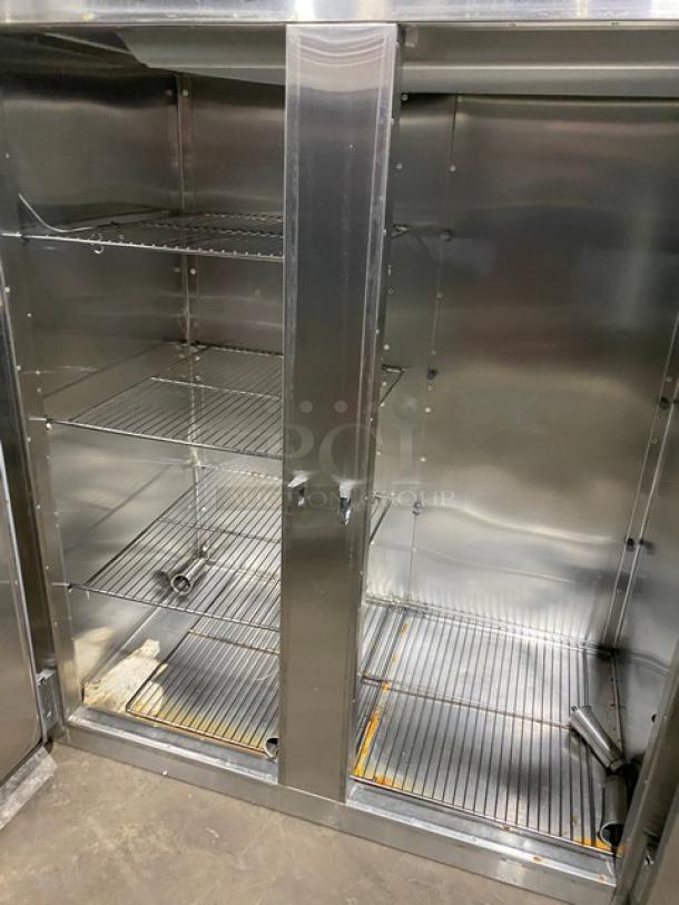 Traulsen 1RHT232WUT stainless steel 2-door refrigerator with chrome-plated racks; excellent condition, SN: V606060I92.