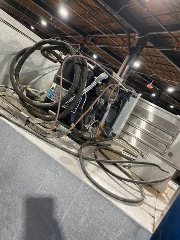 Traulsen stainless steel 2-door reach-in refrigerator, model 1RHT232WUT, with chrome rack and visible wiring. 115V, 1-phase.