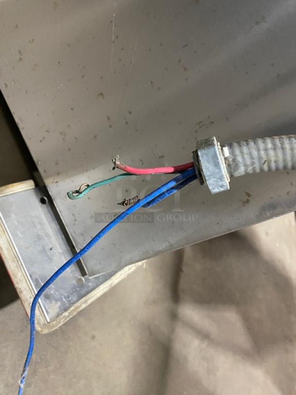 Alto-Shaam stainless steel countertop rotisserie oven with exposed wires, digital controls; needs repair.