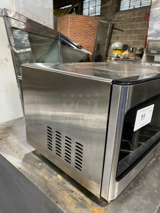 GE JES1145SH1SS stainless steel microwave, 2018 model, commercial grade, electric powered, excellent condition.