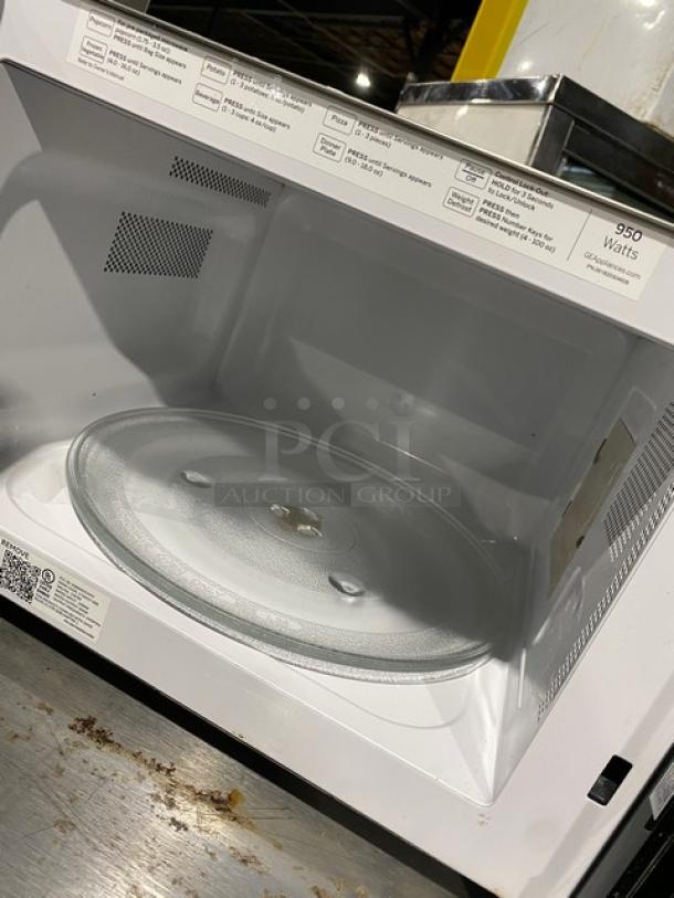 GE Appliances 2018 stainless steel countertop microwave, model JES1145SH1SS, 950 watts, commercial use, excellent condition.