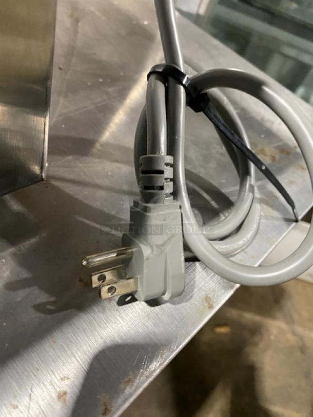 GE 2018 stainless steel electric countertop microwave, model JES1145SH1SS. Features visible power cord.