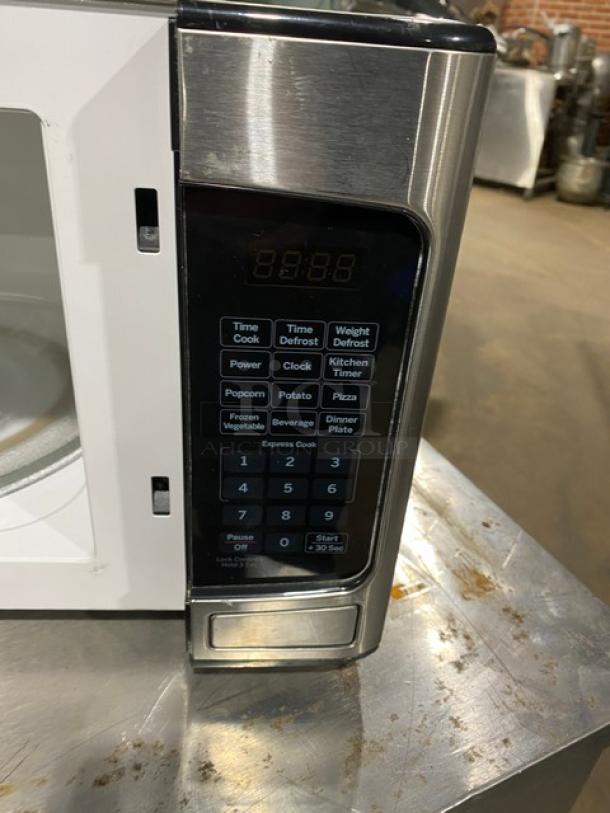 GE JES1145SH1SS stainless steel countertop microwave, keypad visible, commercial model, excellent condition, 2018 model.