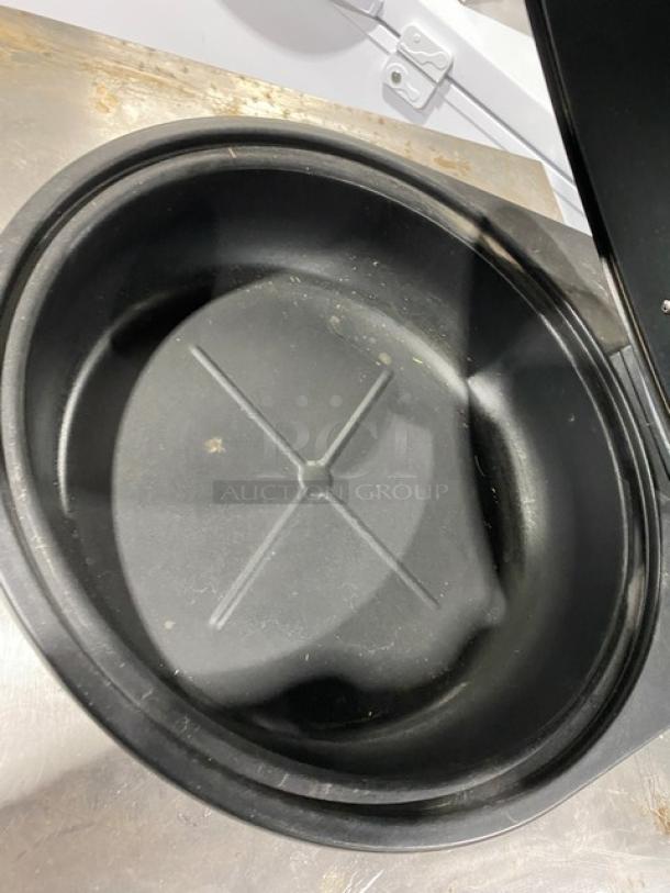 Spring USA induction chafing dish with chrome handle, lid open, good condition, round black interior, suitable for buffet use.