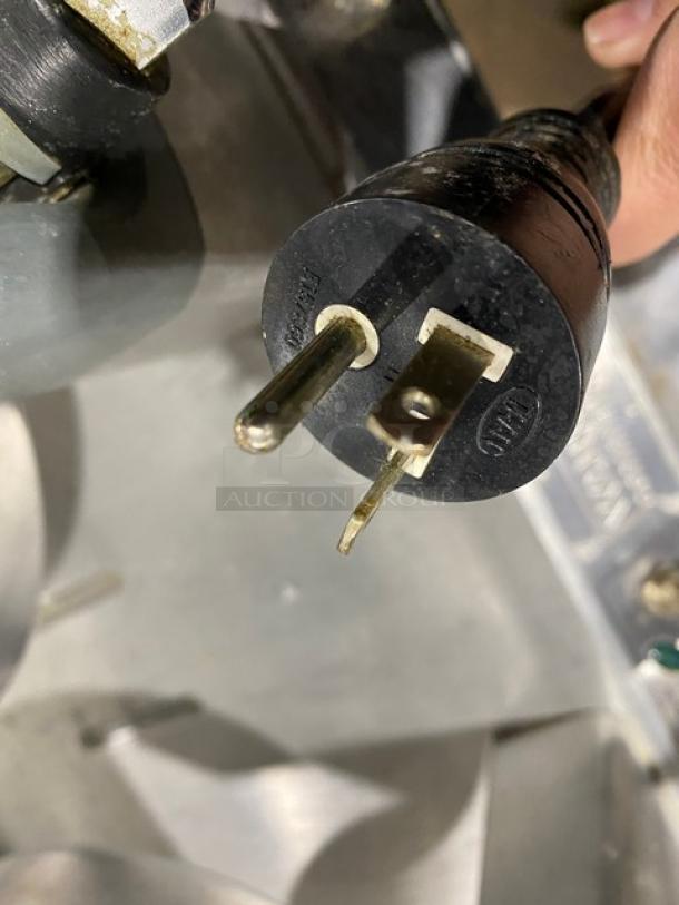 Waring Commercial Stainless Steel Electric Countertop Double Belgian Waffle Maker model WW250, shown with 120V plug.