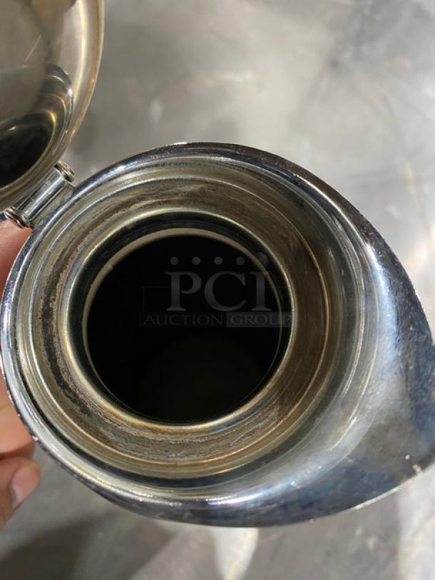 Service Ideas stainless steel 1.5L insulated pitcher; double-walled design, good condition, suitable for beverages.