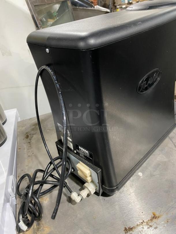 Mars Drinks Flavia Creation400TM black single-serve coffee machine, 120V, electric powered, compact design, good condition.