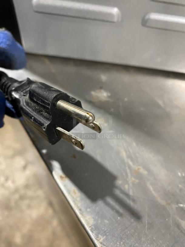 Aramark Model 12CHCMU3ARA electric water cooler/heater plug, indicating 120V power requirement.