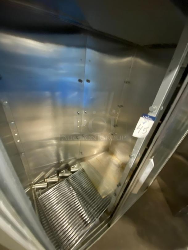 Traulsen stainless steel reach-in refrigerator, model RHT232NUTSL012, with two sliding glass doors and wired rack, 115V, 1 phase.