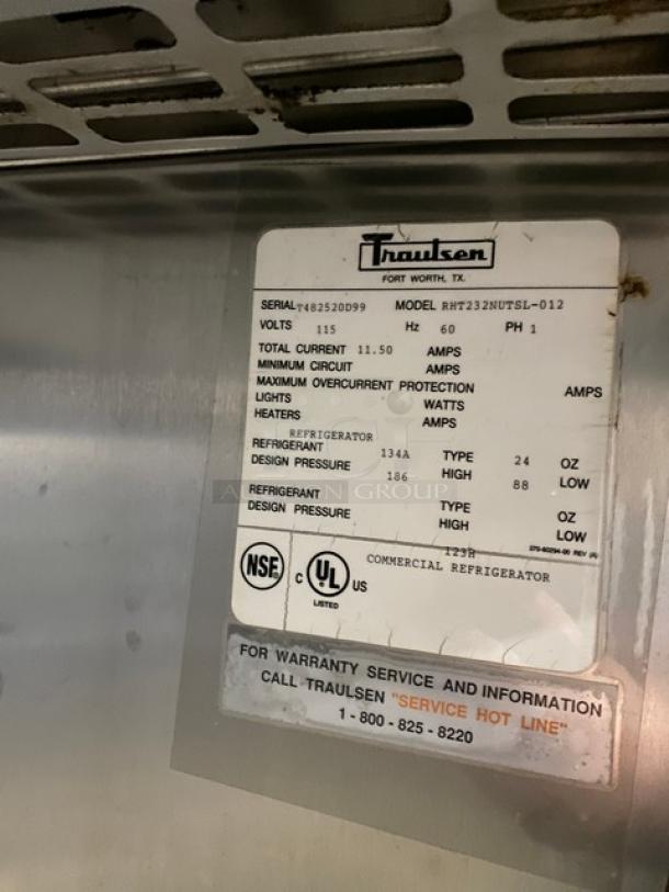 Traulsen commercial refrigerator label showing model RHT232NUTSL-012, SN T482520D99, 115V, 1 Phase, with warranty info.