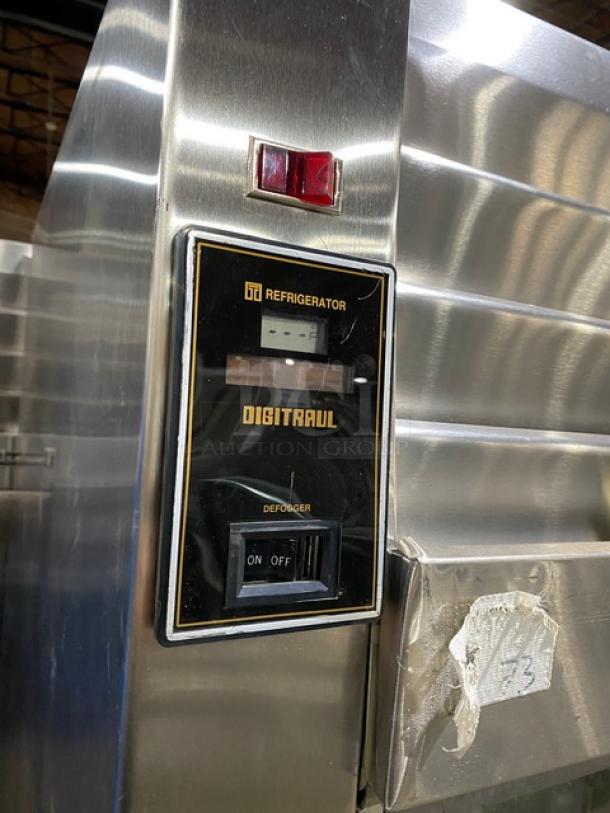 Traulsen RHT232NUTSL012 stainless steel refrigerator control panel with defroster switch and digital display.