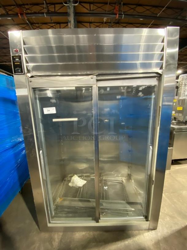 Traulsen stainless steel reach-in refrigerator, model RHT232NUTSL012, with 2 sliding glass doors and wired rack, 115V.
