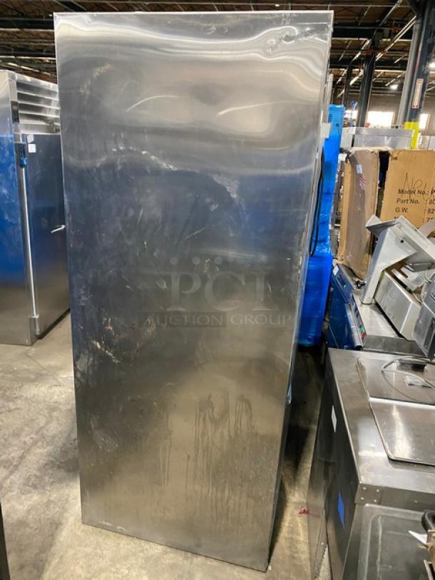 Traulsen stainless steel electric reach-in refrigerator, model RHT232NUTSL012, two sliding glass doors, wired rack, used condition.