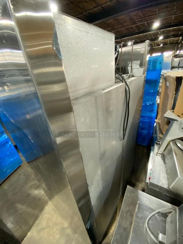 Traulsen stainless steel 2-sliding glass door refrigerator, Model RHT232NUTSL-012, includes wired rack, electric-powered, used.