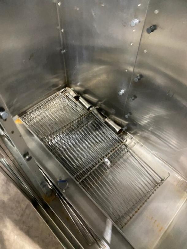 Traulsen commercial stainless steel reach-in refrigerator, model RHT232NUTSL012, features wired rack, 2-sliding glass doors.