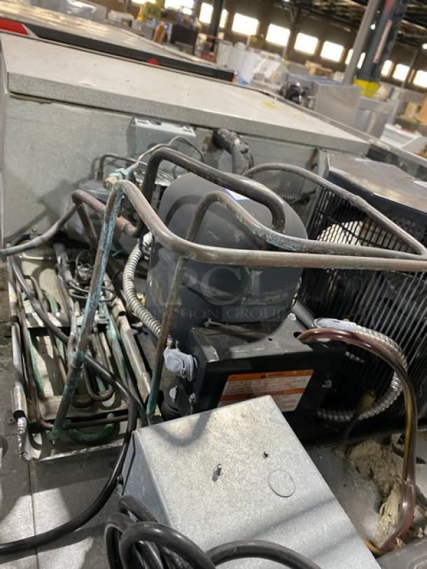 Traulsen RHT232NUTSL012 refrigerator compressor unit, showing wiring and components, in used condition.