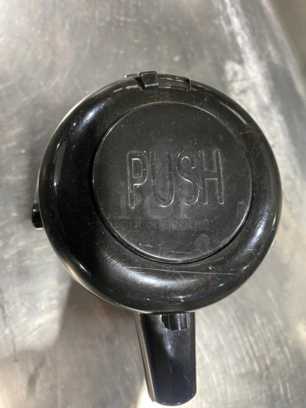 Commercial stainless steel insulated beverage dispenser with push-button spout. Durable, excellent condition. Perfect for events.