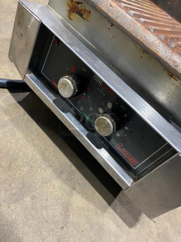 Lang Pane Bella Series PB-12 commercial countertop panini griddle with grooved grates. Stainless steel, electric, on legs.