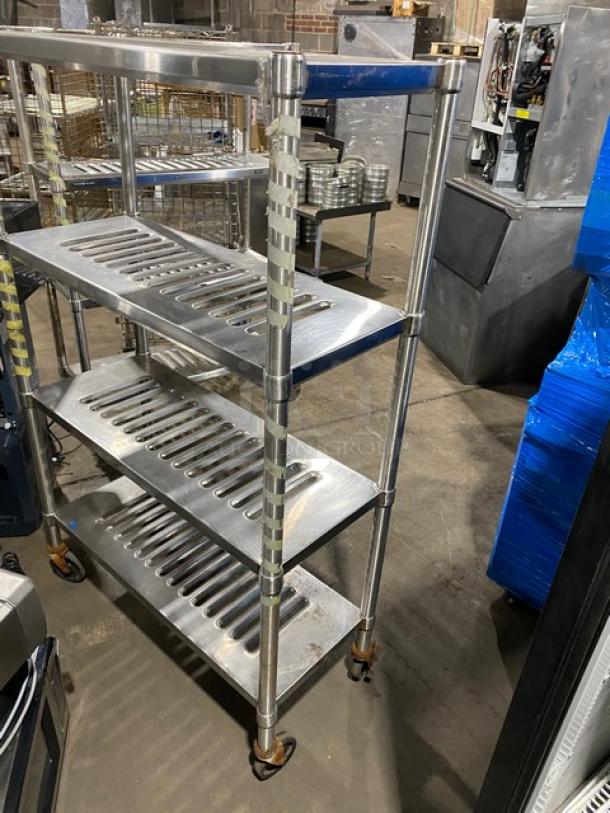Commercial heavy-duty 4-tier mobile drying rack with ventilated metal shelves on casters; excellent condition.