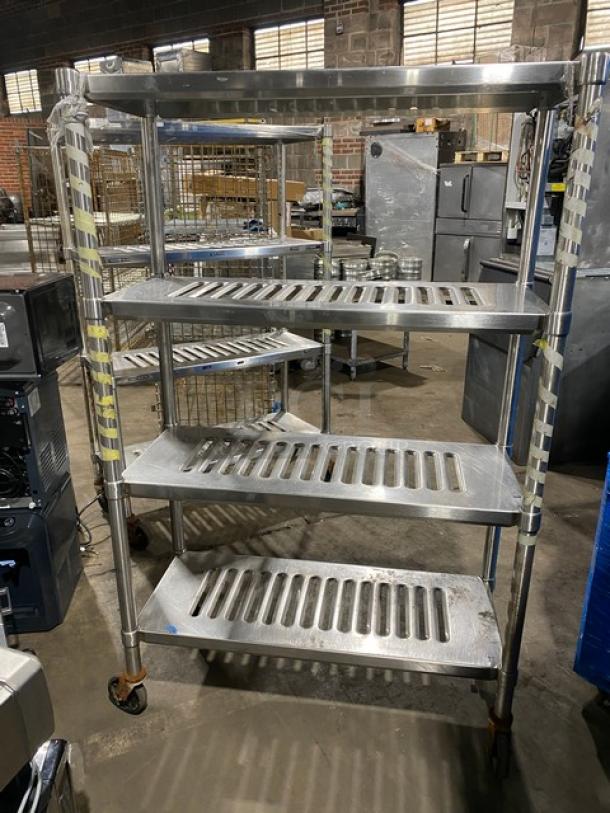 Commercial 4-tier heavy duty mobile drying rack with slatted shelves on casters, stainless steel, clean condition.
