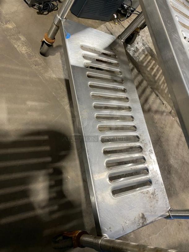 Commercial heavy-duty 4-tier mobile drying/utility rack on casters. Metal construction, vented shelves, used condition.